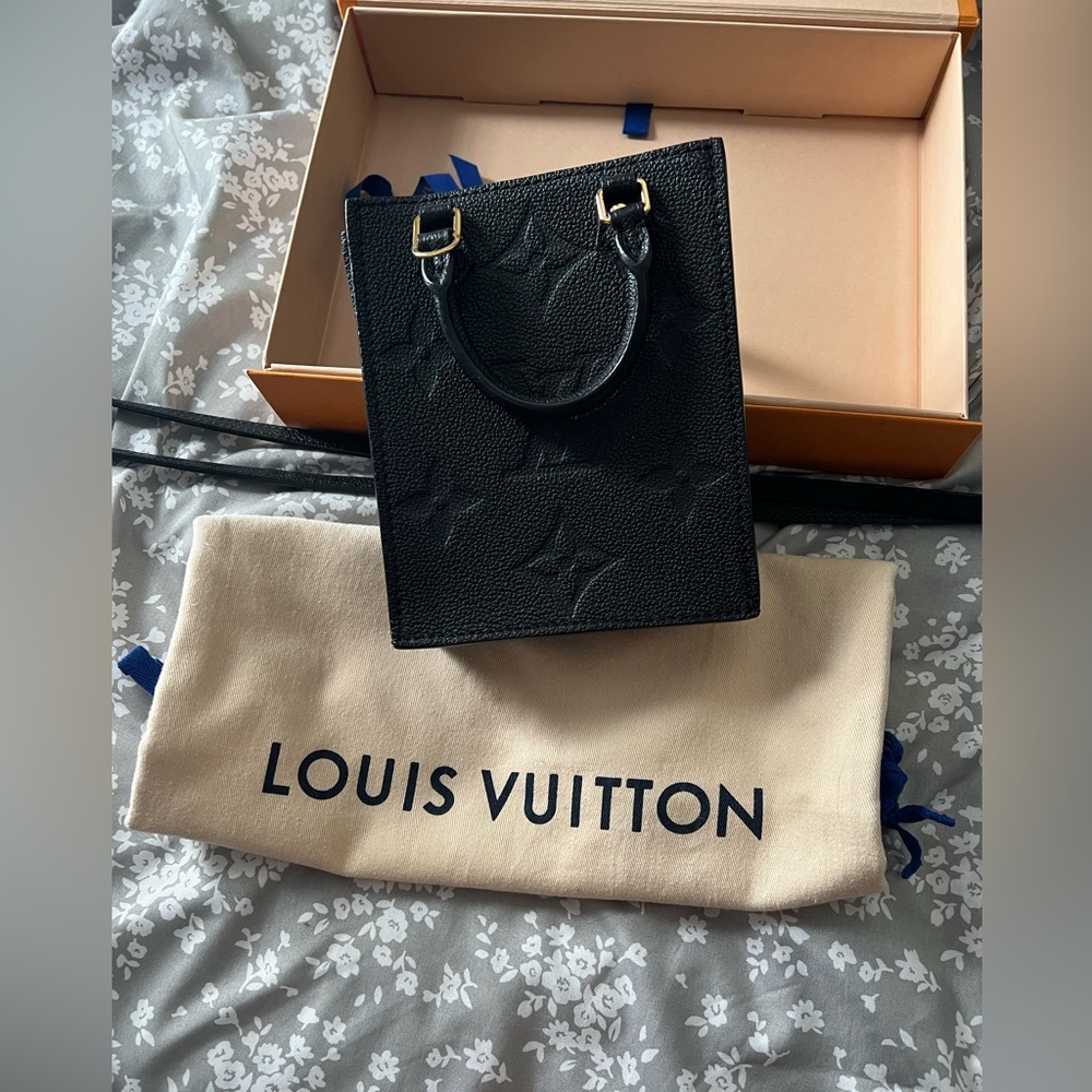 LOUIS VUITTON
Empreinte Monogram  Petit Sac Plat Black